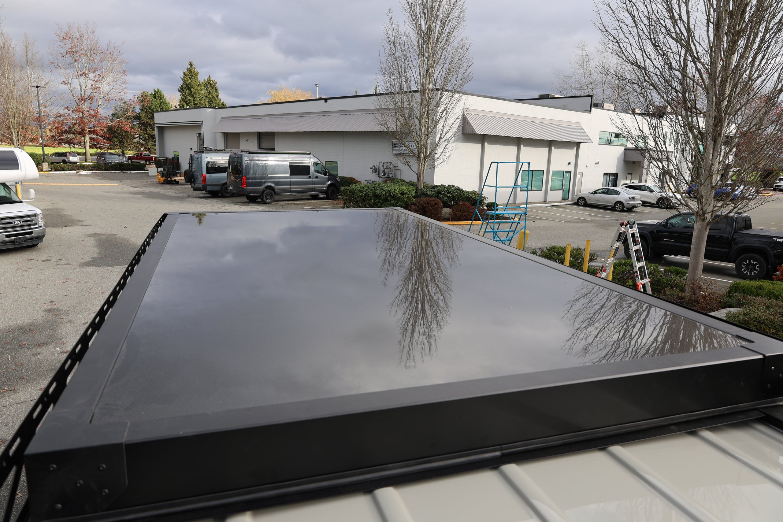 Sprinter carbon fiber roof top tent detail