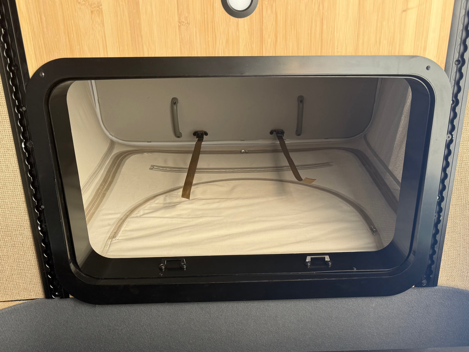 Sprinter rooftop tent deployed with clean organized fabric
